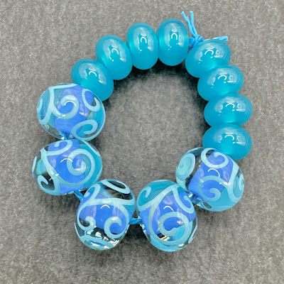 Handmade lampwork glass beads by Laura Sparling Handmade lampwork glass beads by Laura Sparling