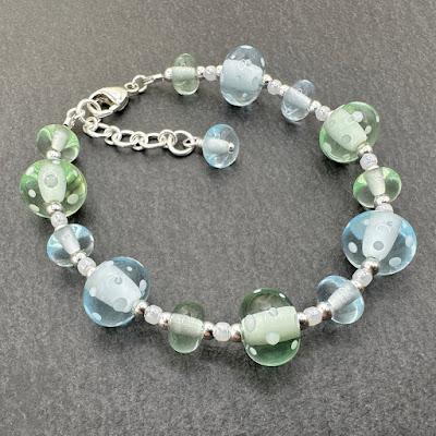 Handmade lampwork glass beads by Laura Sparling Handmade lampwork glass beads by Laura Sparling