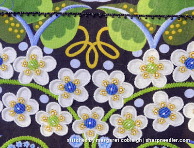 Wild Child, Japanese Bead Embroidery: Gold Curl at Top Procrastinating on stitching the golden curly element at the top of Japanese bead embroidered purse Wild Child. (Wild Child Japanese Bead Embroidery by Mary Alice Sinton)