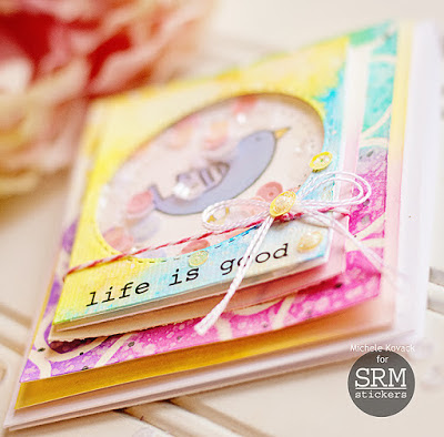 Water colored shaker card using @SRM and @SBAdhesivesby3L Created by Michele Kovack