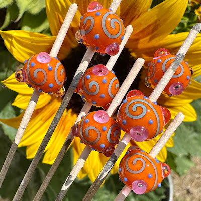 Handmade lampwork glass beads by Laura Sparling Handmade lampwork glass beads by Laura Sparling
