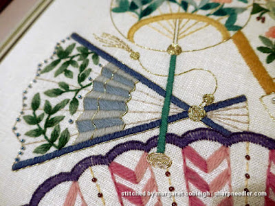 Vintage Crewel Kit: Close-up of Embroidered Blue Fan Close-up of one of the fans from an old commercial crewel kit
