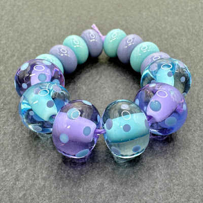 Handmade lampwork glass beads by Laura Sparling Handmade lampwork glass beads by Laura Sparling