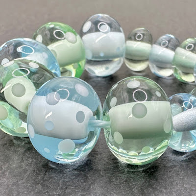 Handmade lampwork glass beads by Laura Sparling Handmade lampwork glass beads by Laura Sparling