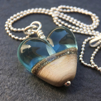 Handmade lampwork glass heart bead necklace by Laura Sparling Handmade lampwork glass heart bead necklace by Laura Sparling