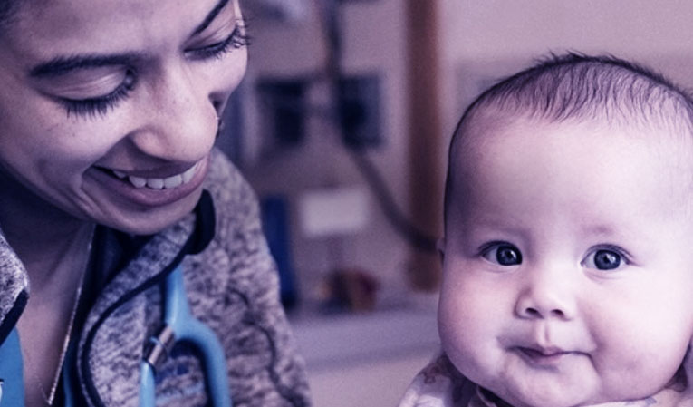 An Advanced Practice Physician with a baby