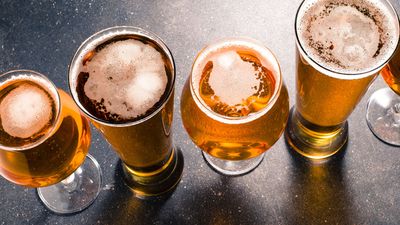 Beer glasses on dark table