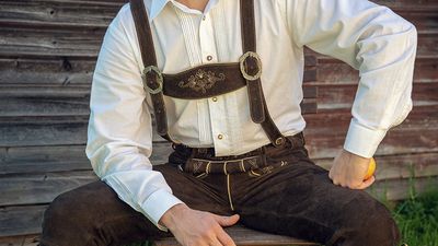 An image of a man wearing lederhosen. Germany, clothes