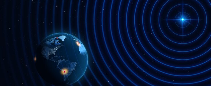 The illustration shows Earth in 3D on the left, with red dots on it. Some of the dots are brightened up in a yellow glow. To the right, a distant active galaxy, which is so far away that it is viewed as a star-like point of light, is depicted, with concentric circles around it that take up the entire frame.