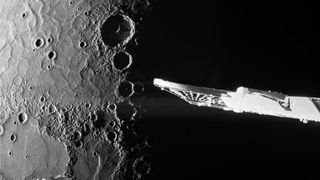 a black and white flyby close-up of Mercury's cratered surface