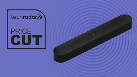 Sonos Beam Gen 2 Soundbar with Dolby Atmos in black on purple background with TechRadar price cut sign