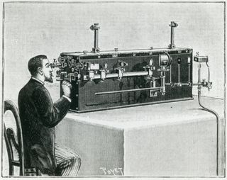 Illustration of a man sitting while looking into a large apparatus on a table