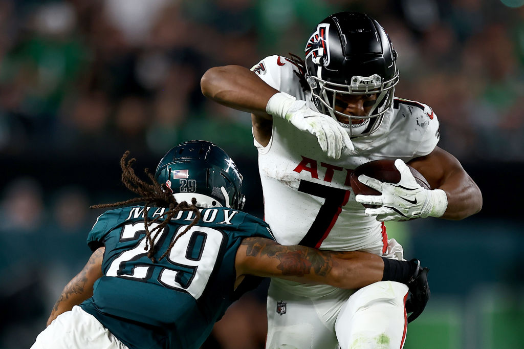 Bijan Robinson #7 of the Atlanta Falcons gets tackled by Avonte Maddox #29 of the Philadelphia Eagles during the second quarter in the game at Lincoln Financial Field on September 16, 2024