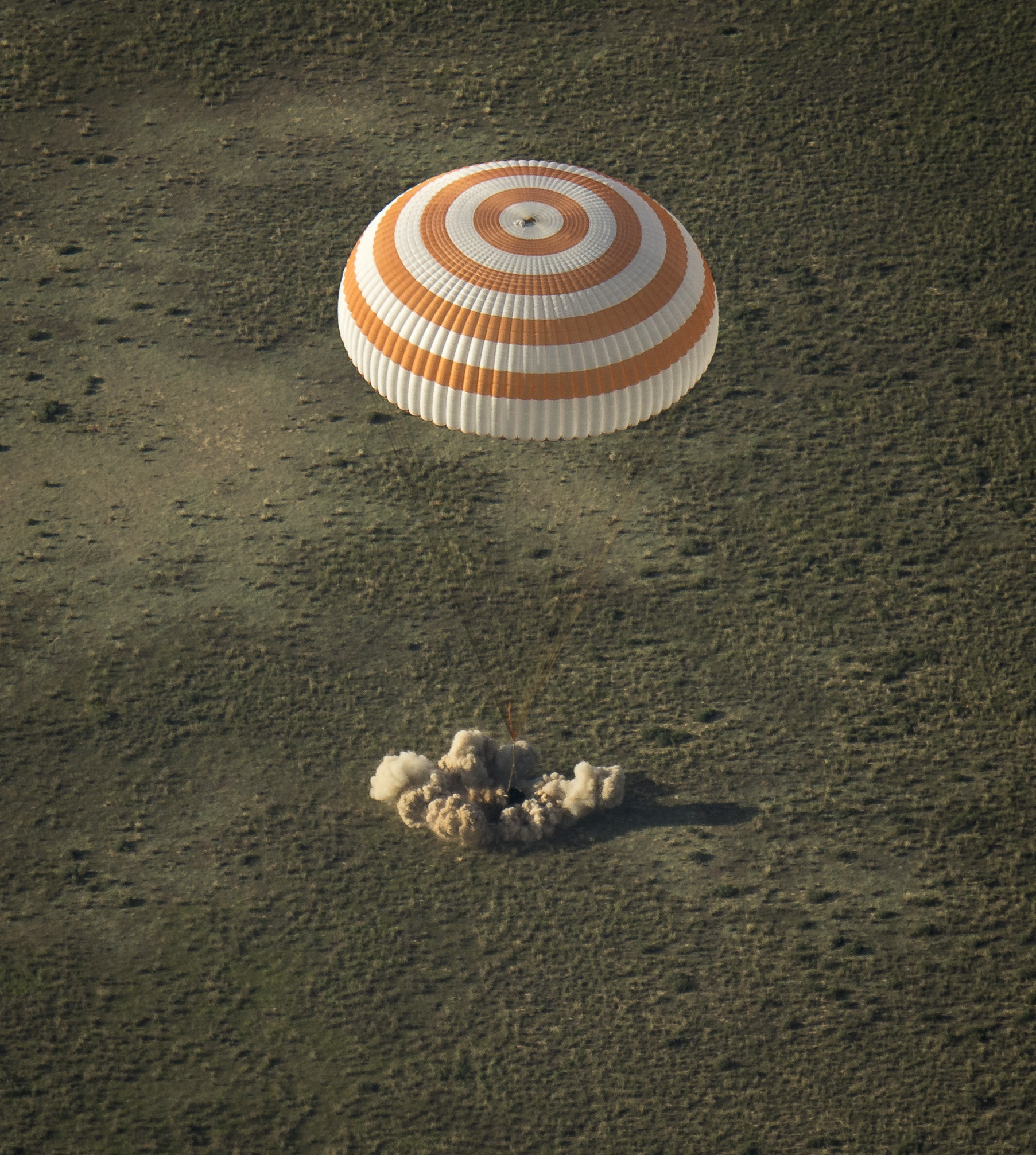 A Soyuz TMA-11M space capsule lands with Expedition 39 Commander Koichi Wakata of the Japan Aerospace Exploration Agency (JAXA), Soyuz Commander Mikhail Tyurin of Roscosmos, and Flight Engineer Rick Mastracchio of NASA near the town of Zhezkazgan, Kazakhstan on May 14, 2014.