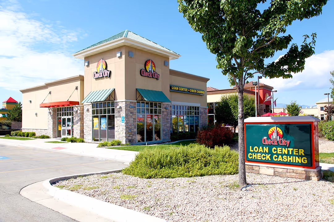 Check City store exterior with green awning