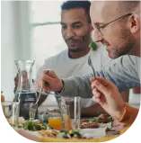 Employees:inside eat at the table during their break