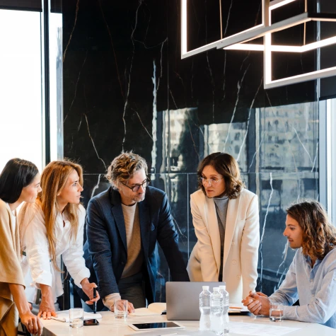 Team of people around table