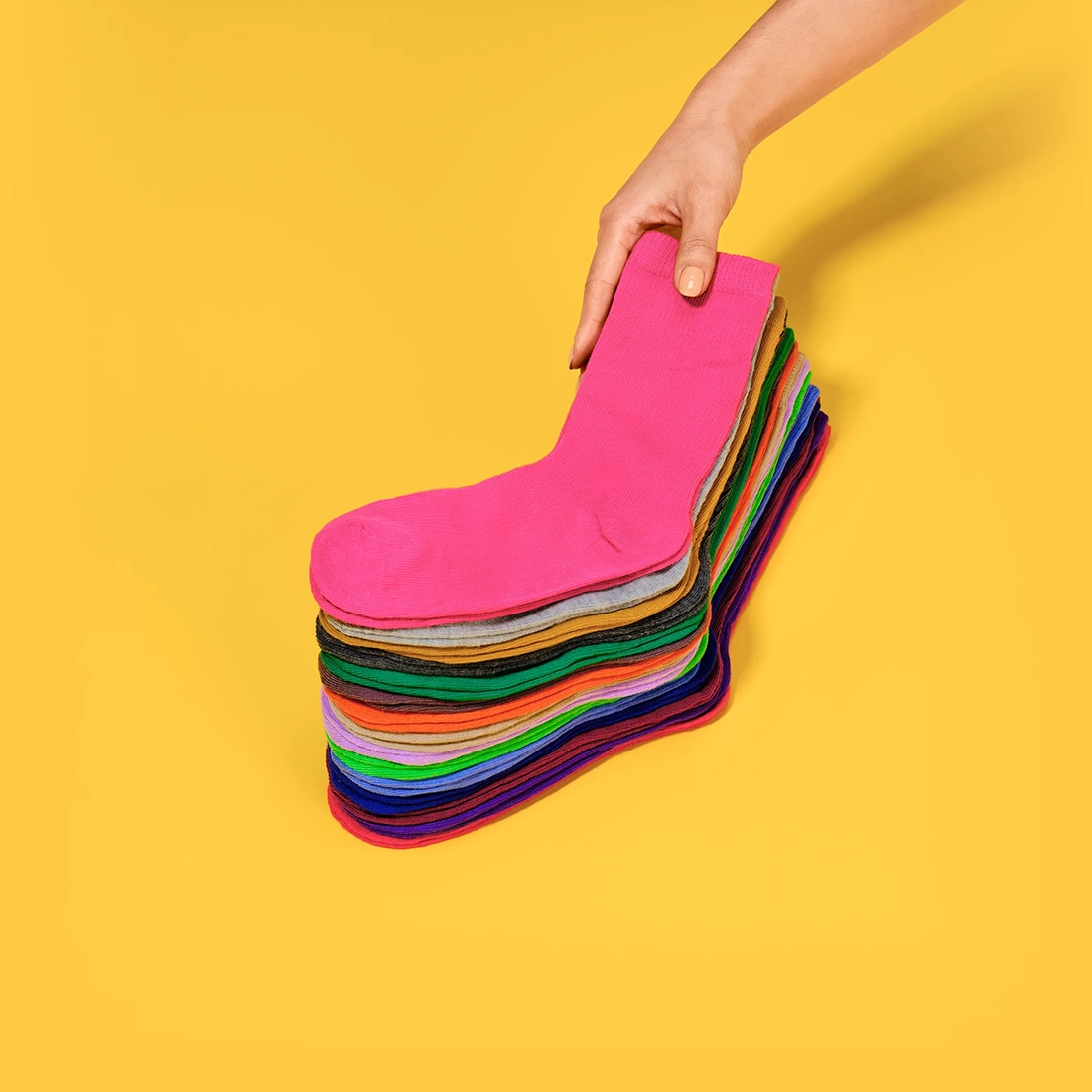 Playful sock and shoe illustration representing Poplin’s no-sock-left-behind promise.