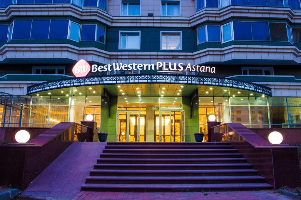 a best western plus argentinian hotel with stairs in front at Best Western Plus Astana Hotel in Astana