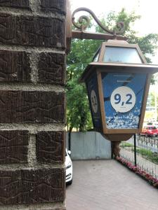 a lantern hanging on the side of a building at Brown Hotel in Astana