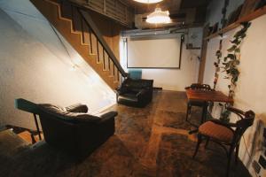 Uma área de estar em Beppu hostel&cafe ourschestra - Vacation STAY 45859