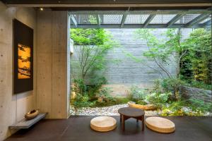 A garden outside Genji Kyoto, a Member of Design Hotels