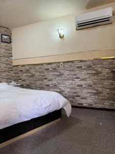 Tempat tidur dalam kamar di Village lereve