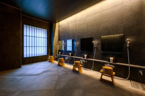 Kylpyhuone majoituspaikassa HOTEL WOOD TAKAYAMA