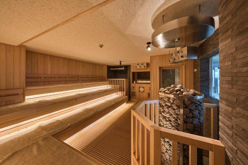 A kitchen or kitchenette at Sauna & Capsule Hotel Rumor Plaza