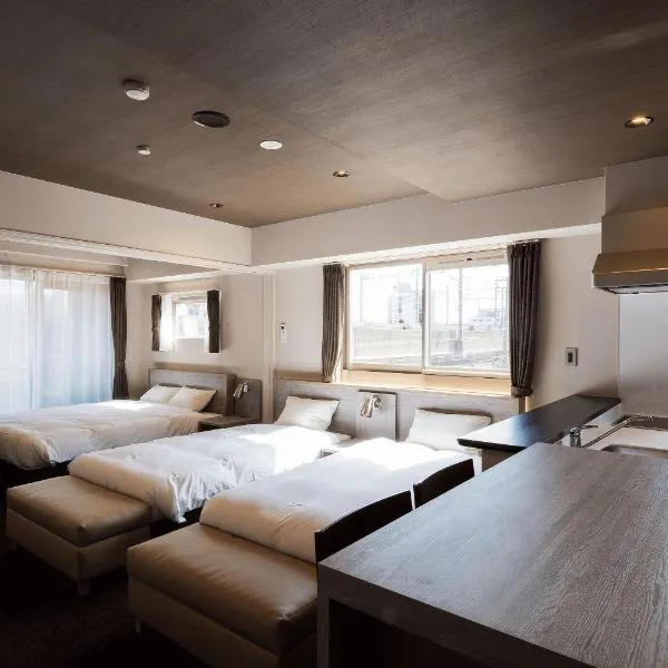 INOVA Kanazawa Station Hotel Suite: Kanazawa şehrinde bir otel