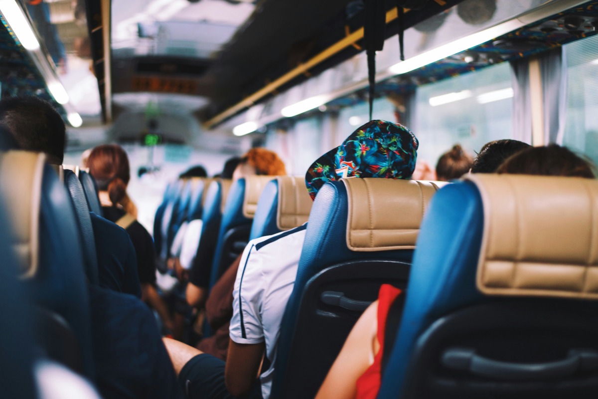 People in bus seats