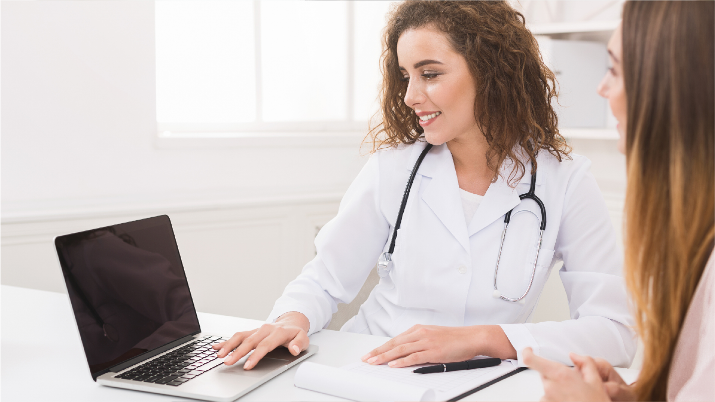 Doctor showing patient their new billing process