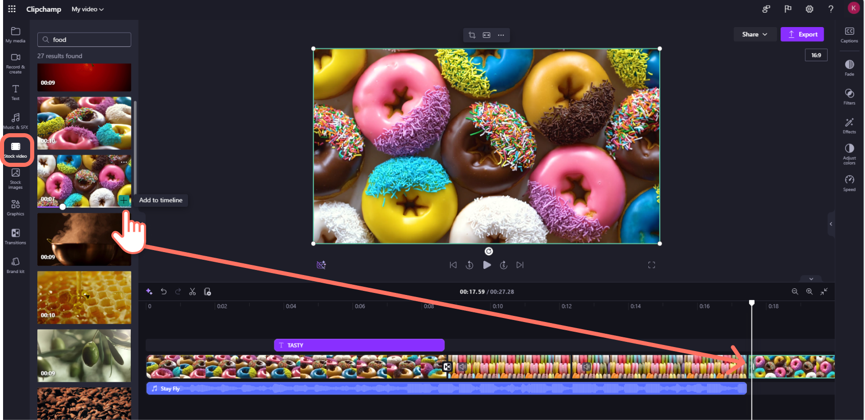 A screenshot of a Clipchamp for work accounts user dragging and dropping stock video onto the tineline