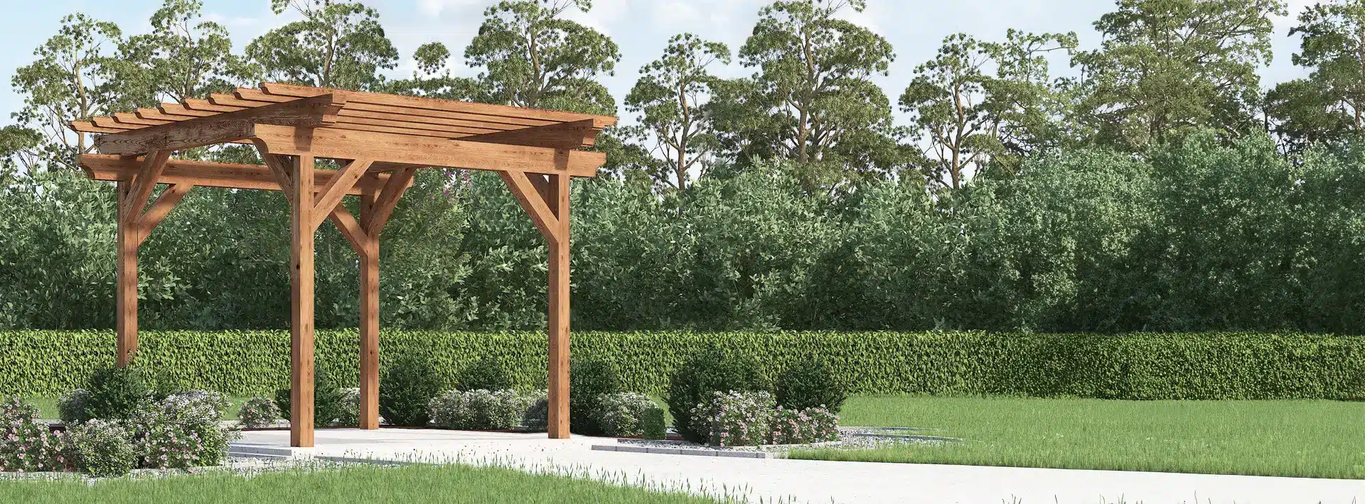 A wooden pergola stands on a stone path, surrounded by neatly trimmed bushes and green grass, with dense trees and a bright sky behind.