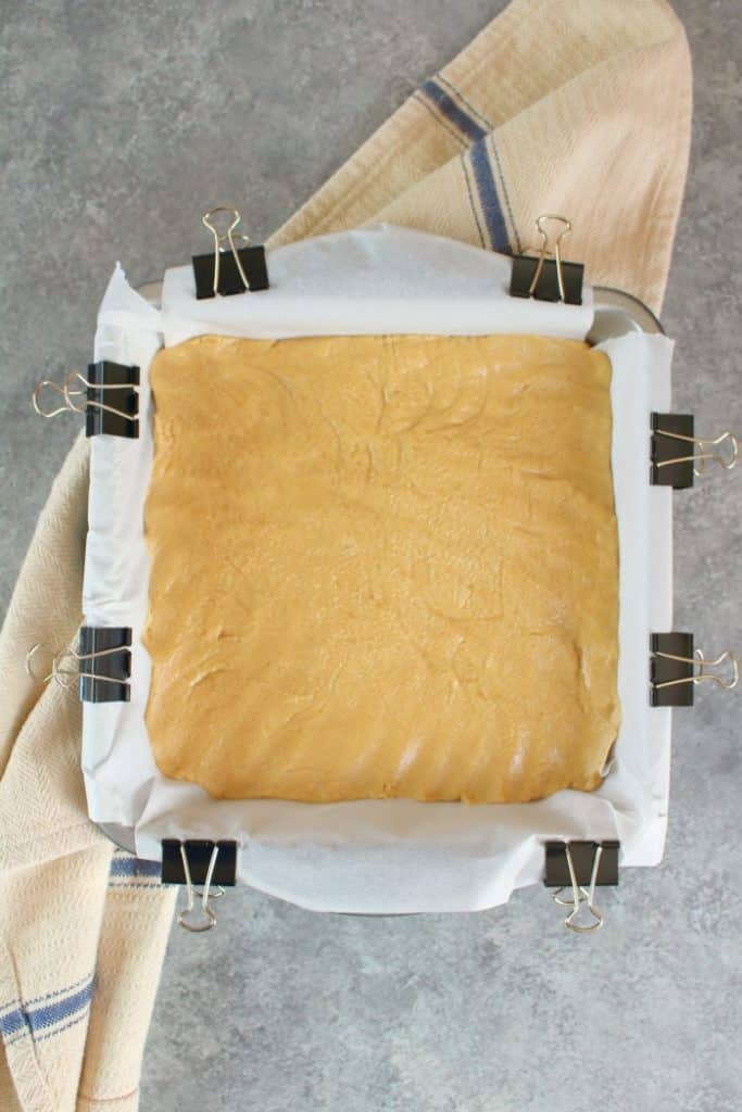 If you're looking for an amazing peanut butter fudge recipe look no further! This incredible Layered Chocolate & Peanut Butter Fudge is super simple to make and the perfect Christmas candy recipe!