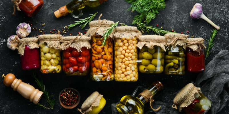 set-canned-vegetables-mushrooms-glass-jars-set-pickled-food-black-stone-background-top-view (1) set-canned-vegetables-mushrooms-glass-jars-set-pickled-food-black-stone-background-top-view (1)