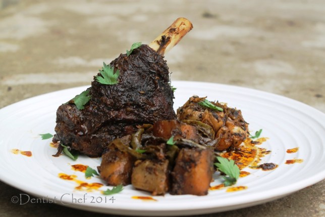 slow roasted goat leg 10 hours spicy harissa herbs rubbed goat kid cabrito young mutton leg oven braised