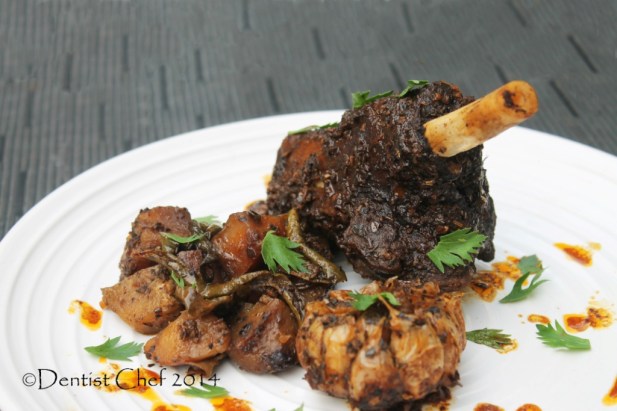 slow roasted goat leg tender meat harissa spicy herbs rosemarry thyme baby goat kid cabrito recipe oven roast