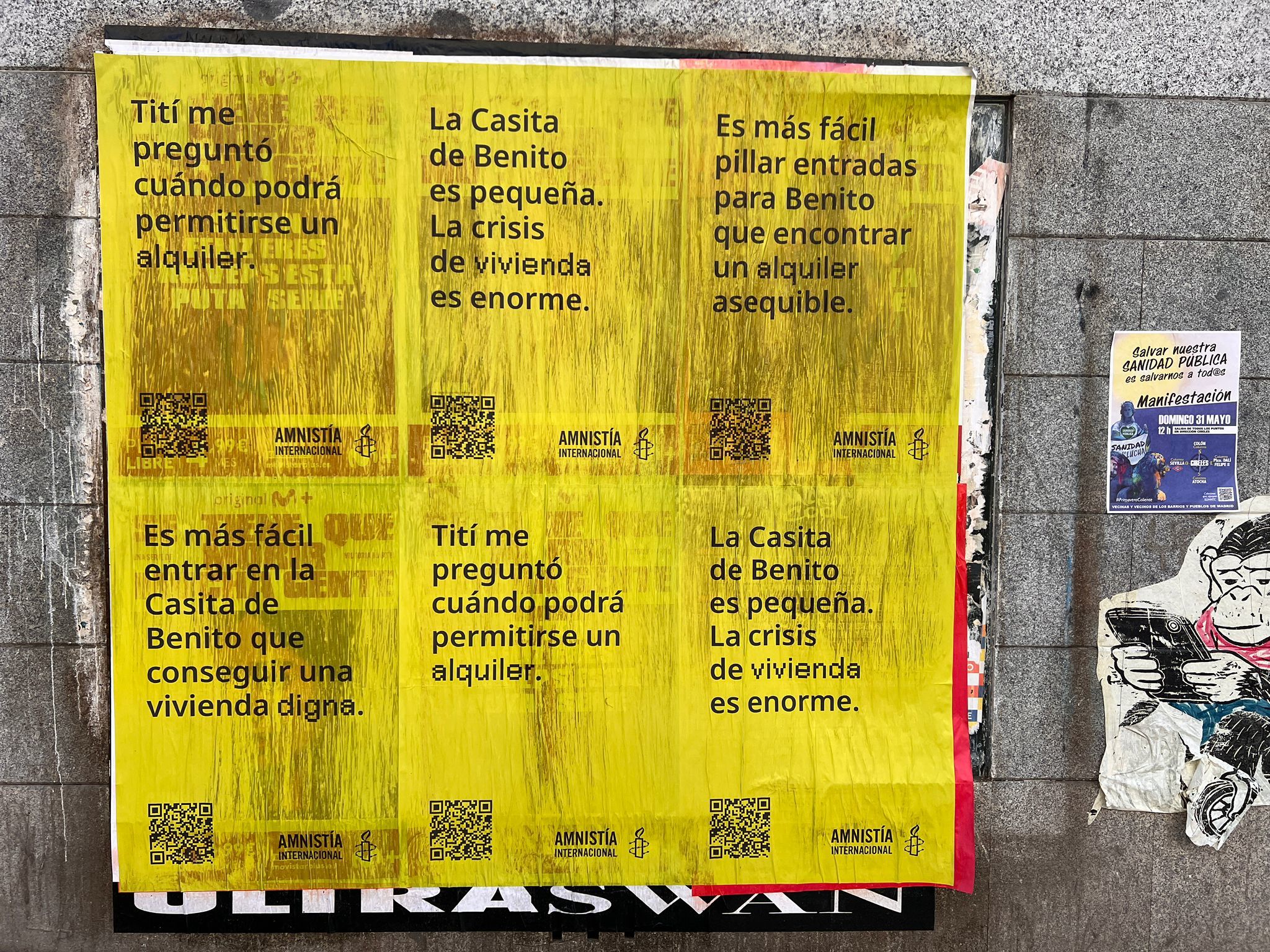 Un conjunto de pancartas con frases de Bad Bunny que denuncian la crisis de vivienda en Espa�a.