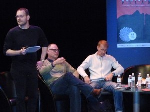 Ace Atkins (centre) and Paul Colize (right) prepare to be interviewed by Vincent Raymond.