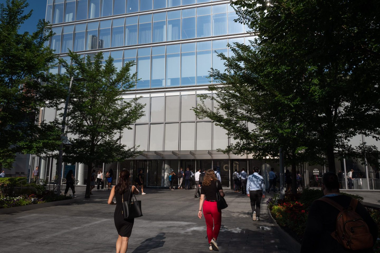 Workers enter Citigroup headquarters in New York, US, on Thursday, Aug. 4, 2022. Citigroup Inc. is planning a 500-person hiring spree over the next three years for a new wealth division catering to junior employees at private equity offices, consultancies and accounting firms, betting those clients will someday join the ranks of the ultra wealthy. Photographer: Juan Cristobal Cobo/Bloomberg via Getty Images