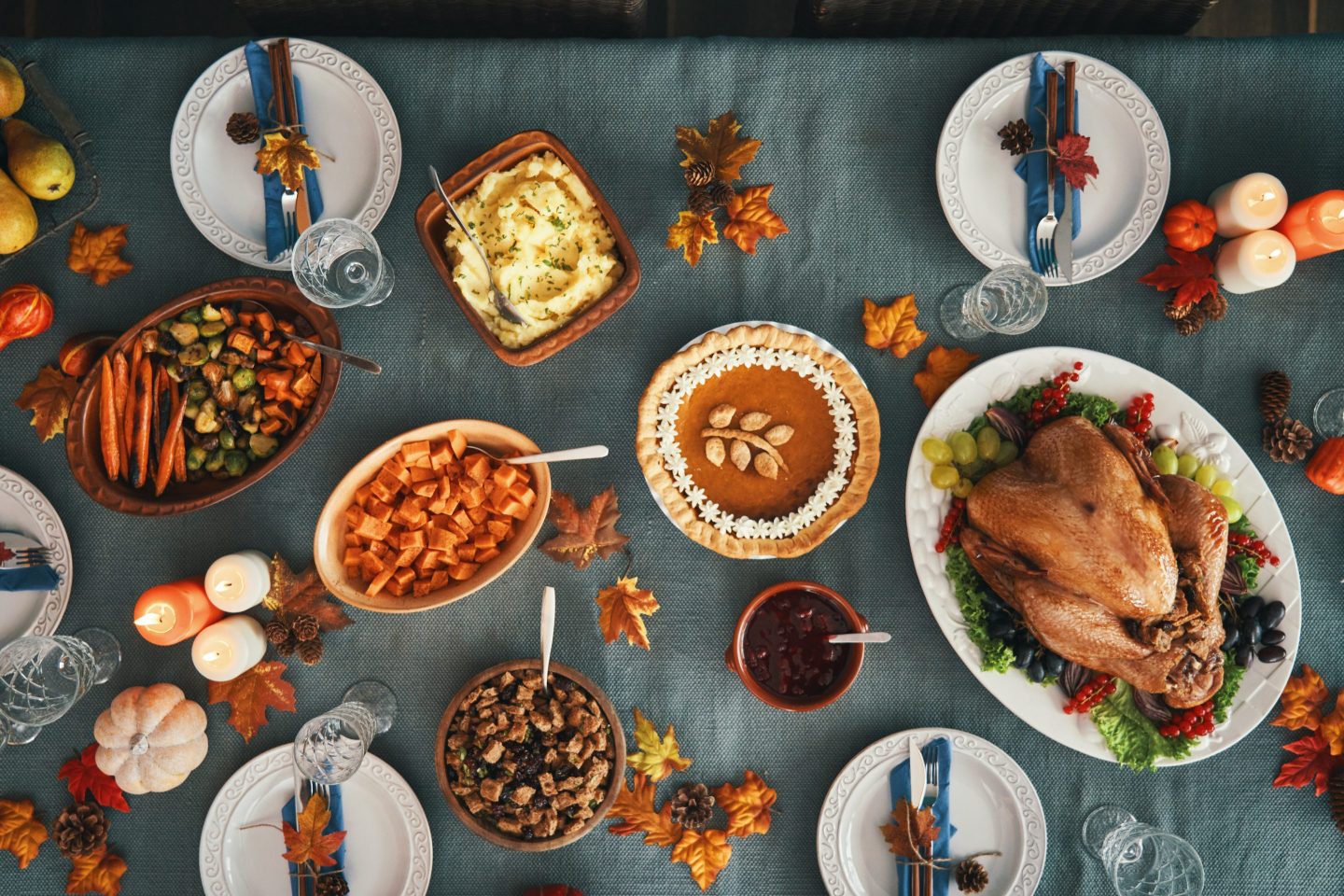 Thanksgiving table spread out and seen from above.