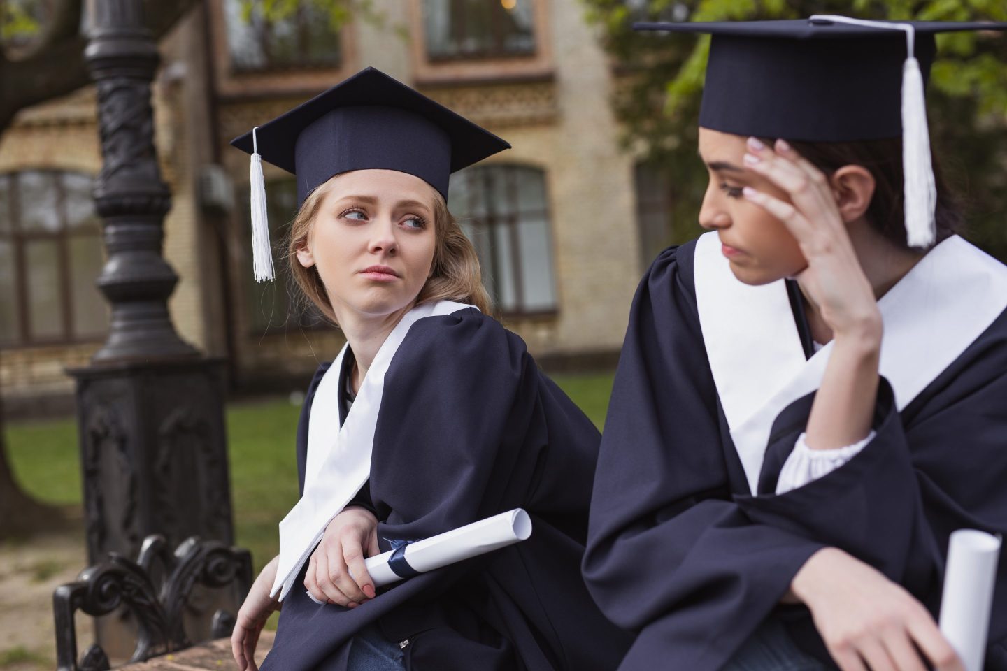 Friends feeling sad after graduation from university