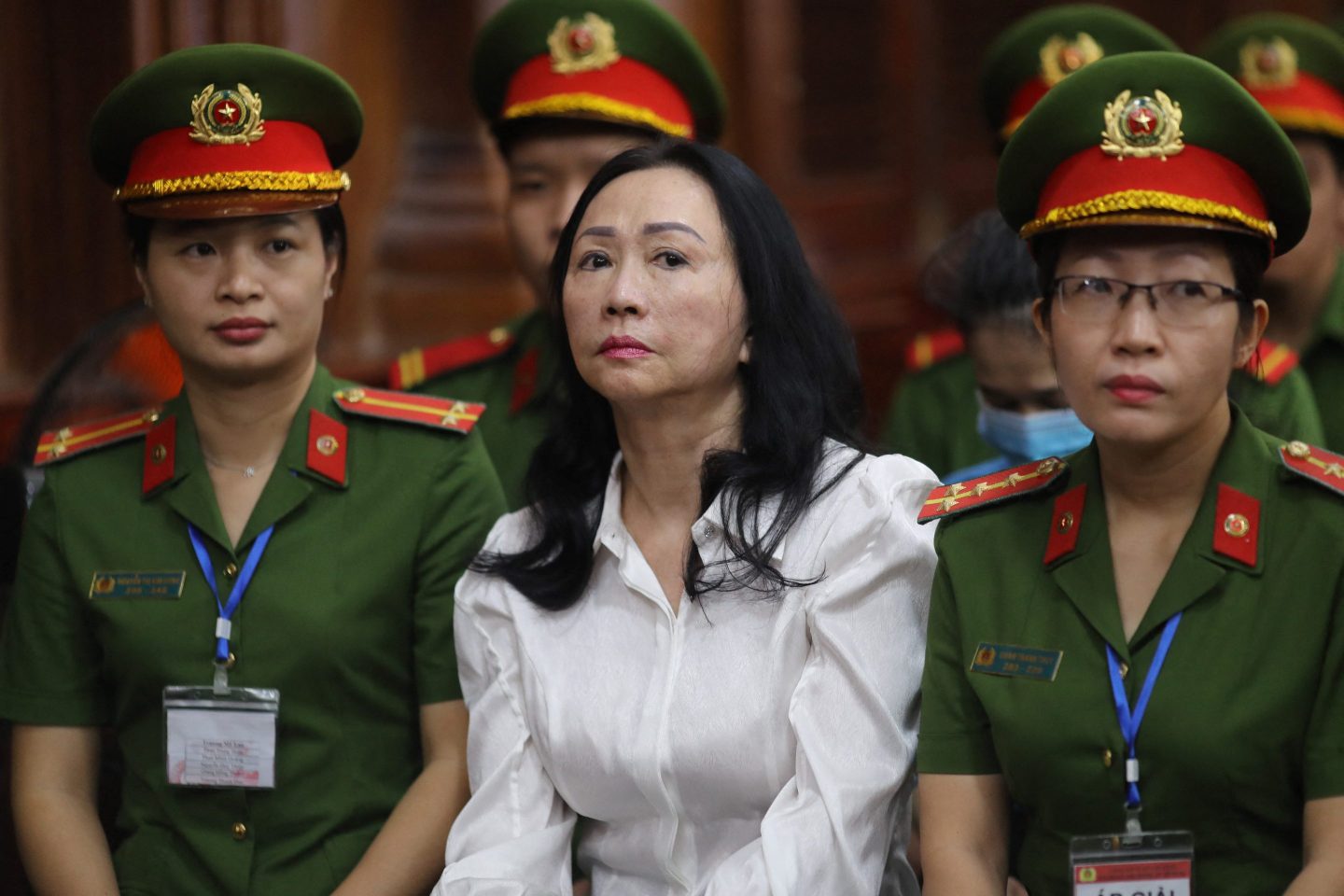 Vietnamese property tycoon Truong My Lan (C) looks on at a court in Ho Chi Minh city on April 11, 2024.