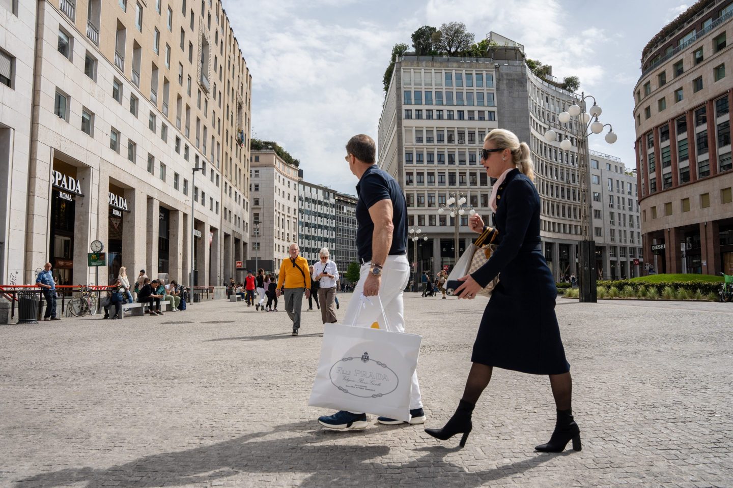 people walking on Milan street