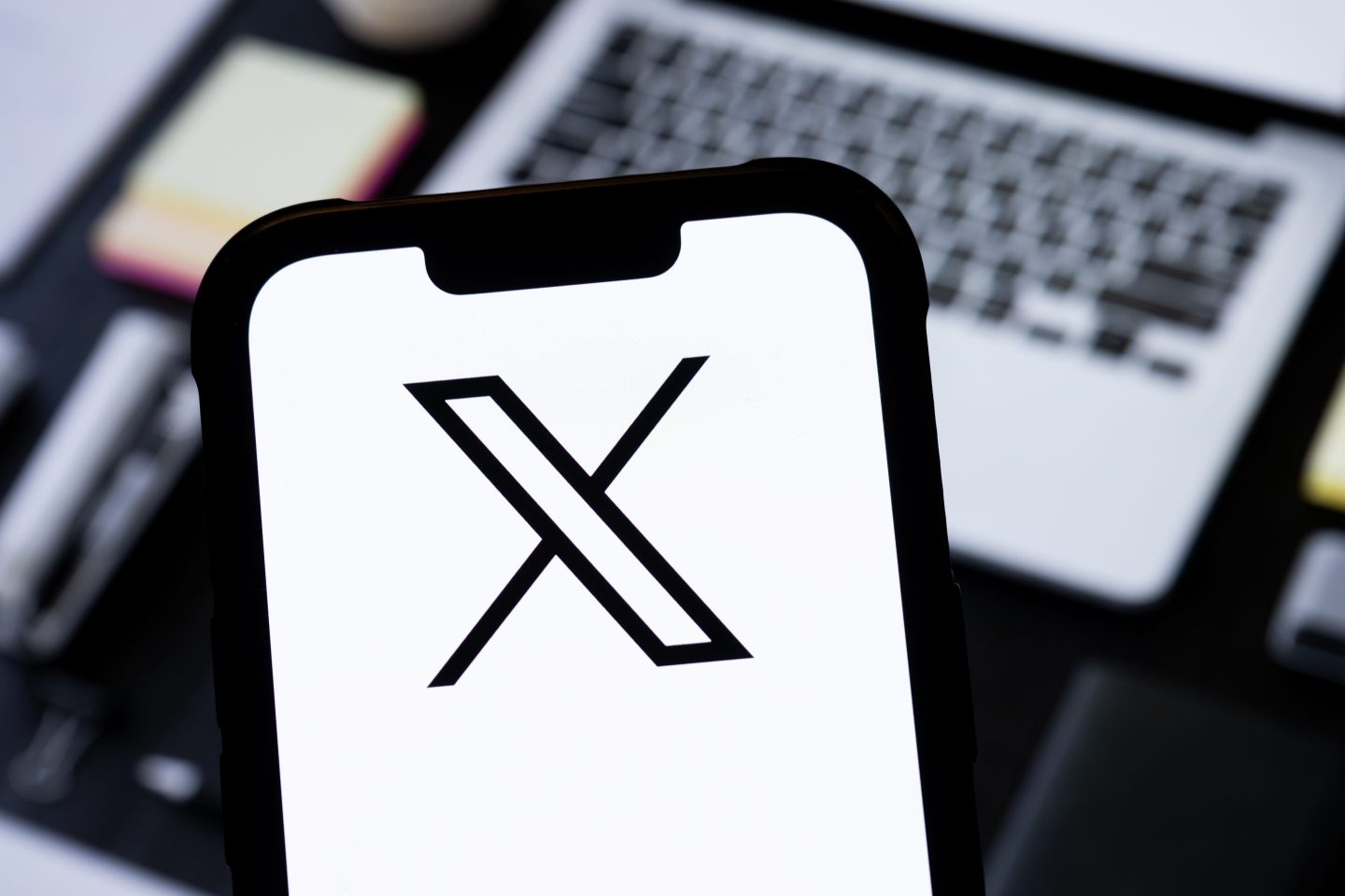 POLAND - 2025/03/02: In this photo illustration, a X (Twitter) logo is seen displayed on a smartphone. (Photo Illustration by Mateusz Slodkowski/SOPA Images/LightRocket via Getty Images)