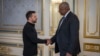 U.S. Secretary of Defense Lloyd Austin, right, and Ukraine's President Volodymyr Zelenskyy shake hands during their meeting in Kyiv, Ukraine, Oct. 21, 2024. (Press Service of the President of Ukraine via AP)