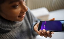 Close-up of young woman talk with virtual digital voice recognition assistant