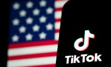 The TikTok logo and flag of the United States are seen on screens on January 18, 2025 in Hong Kong, China. As the impending TikTok ban looms, users are increasingly migrating to alternative platforms like Xiaohongshu, driven by concerns over data privacy and the potential shutdown of their favorite app. This shift reflects a broader trend where users seek platforms that offer similar engagement without the uncertainty surrounding TikTok's future in the U.S., especially as legal battles and political pressures mount ahead of the January 19 deadline for compliance or a ban.