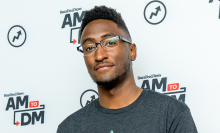 Marques Brownlee in glasses and a gray shirt.